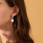 Floating Sparkle Earrings – Suspended Purity